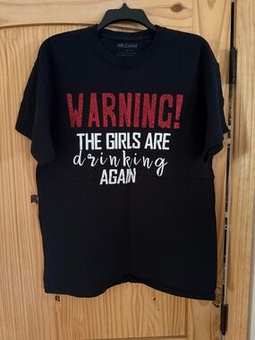 Warning tshirt saying NWOT